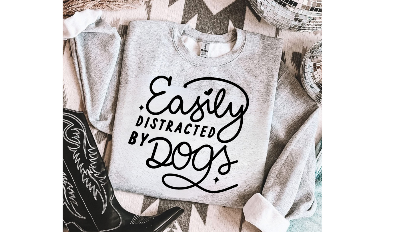 EASILY DISTRACTED BY DOGS