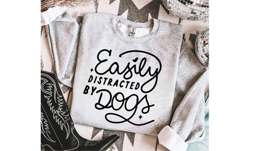 EASILY DISTRACTED BY DOGS
