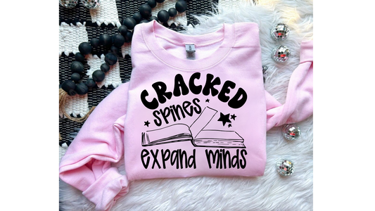CRACKED SPINES EXPAND MINDS