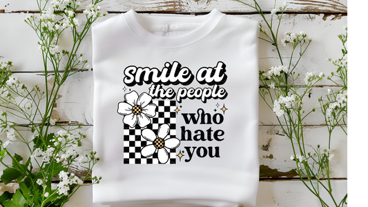 SMILE AT PEOPLE WHO HATE YOU