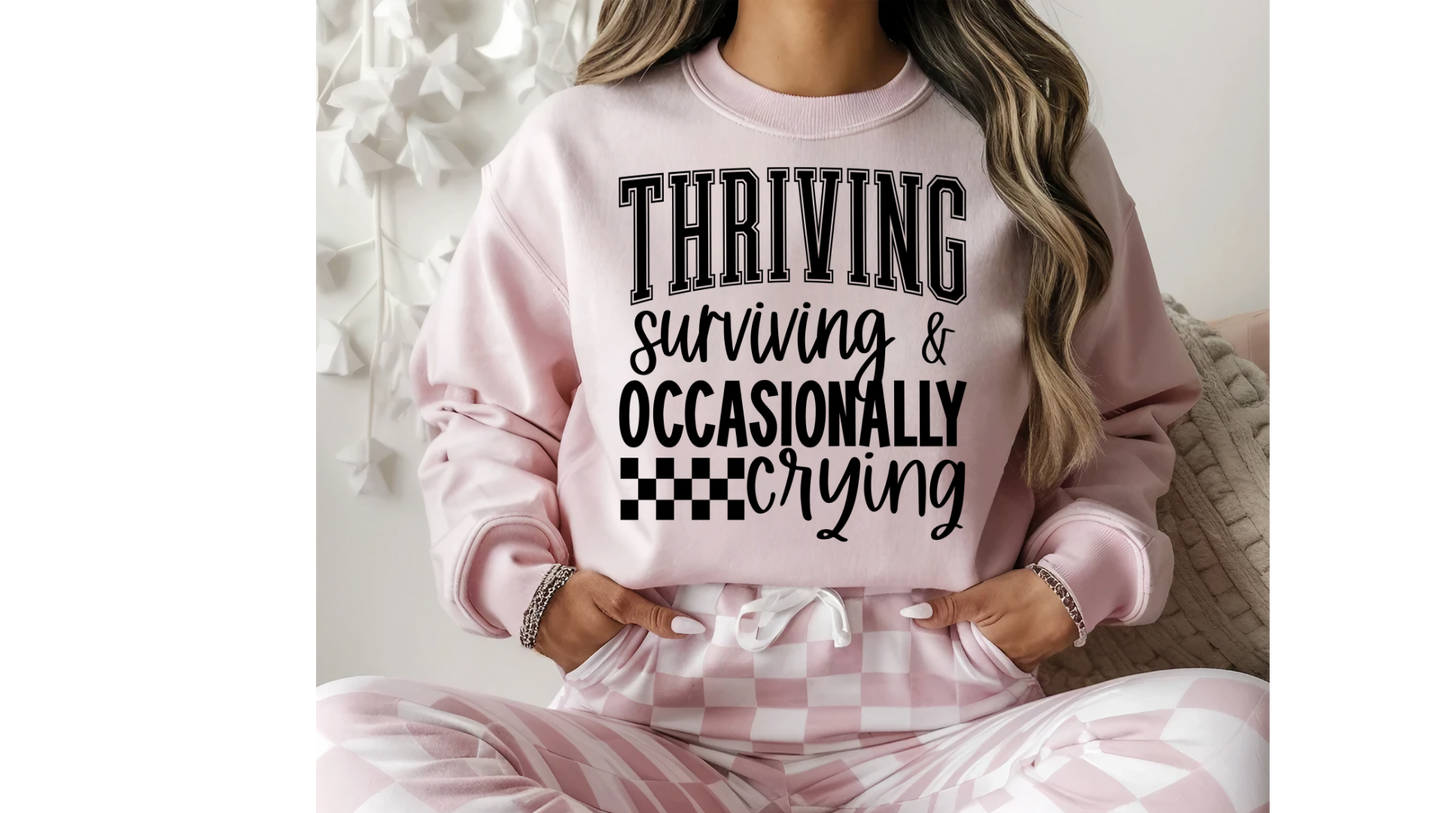 THRIVING SURVIVING CRYING